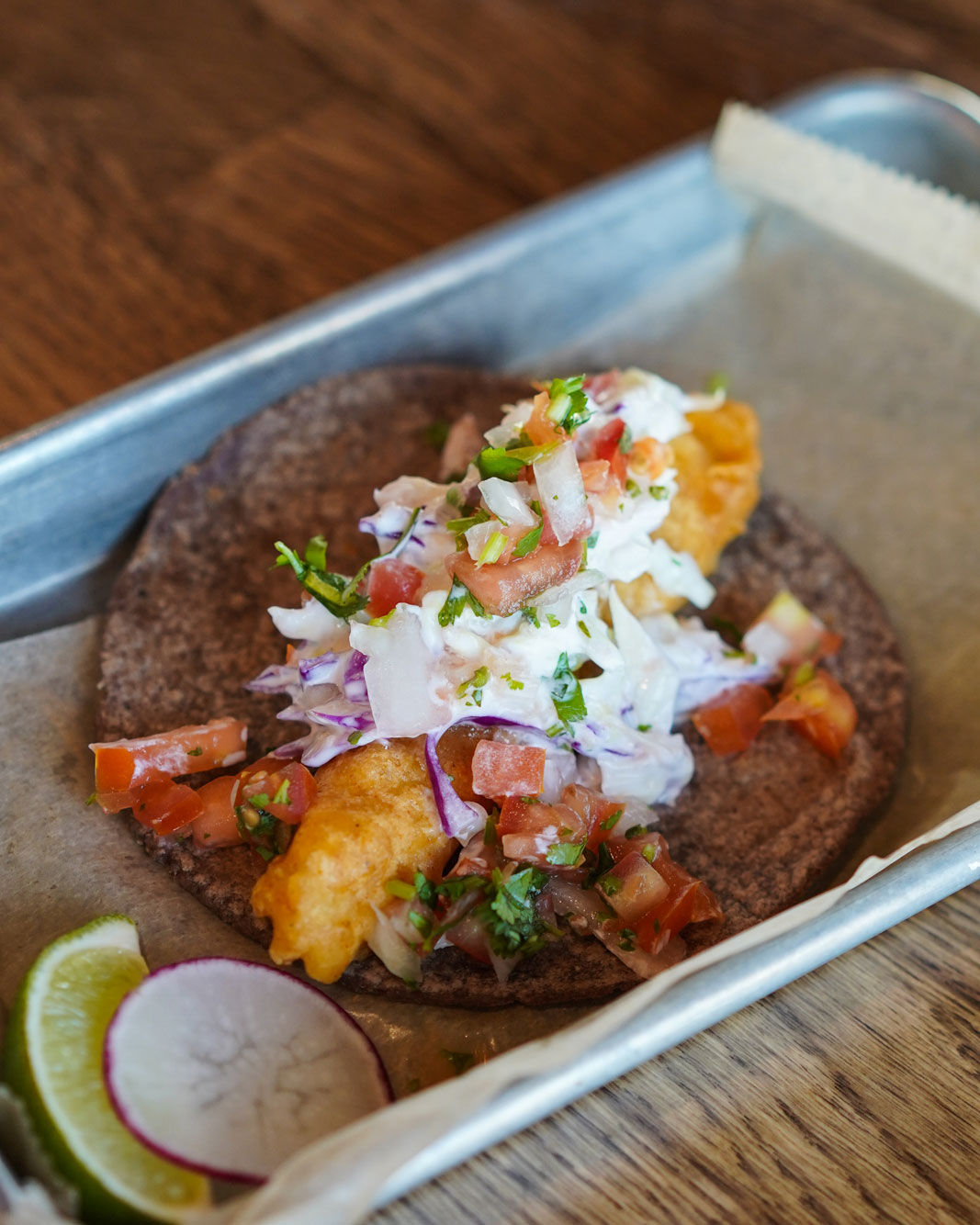 popular fish baja taco at La Lola Taco
